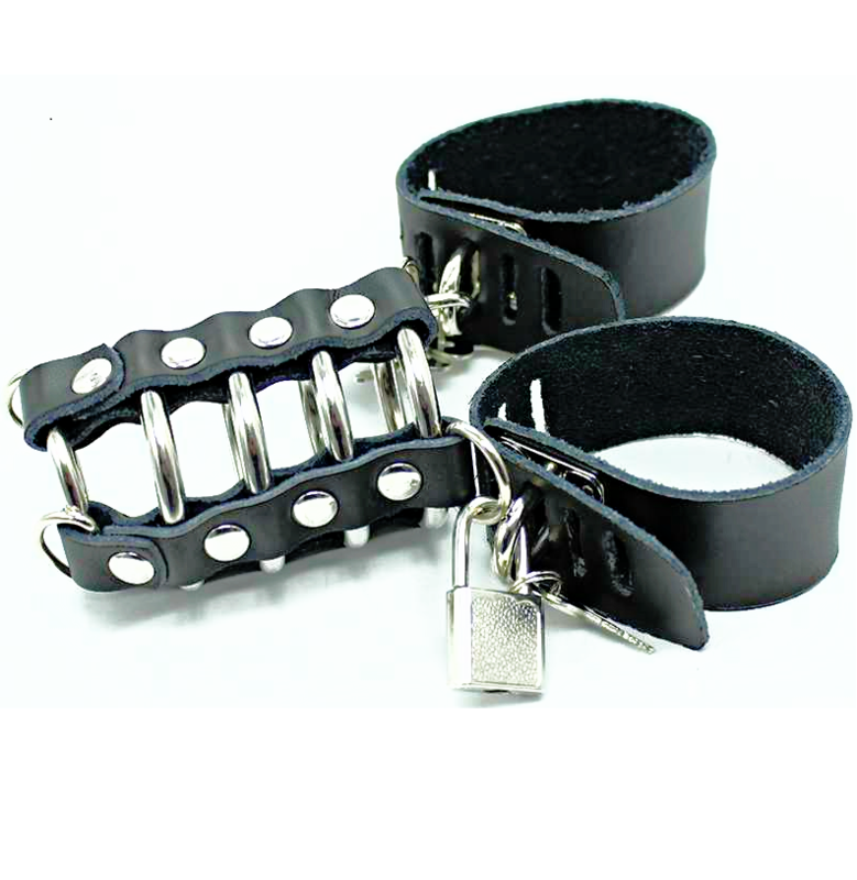 Penis cage with metal rings and leather strap
