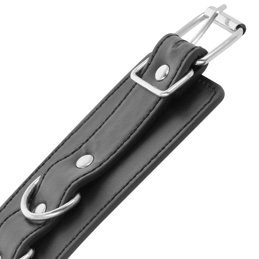Adjustable black leather ankle cuffs
