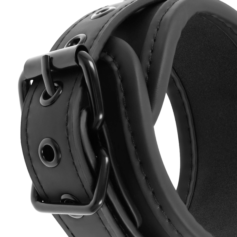Open leg position with neoprene-lined handcuffs